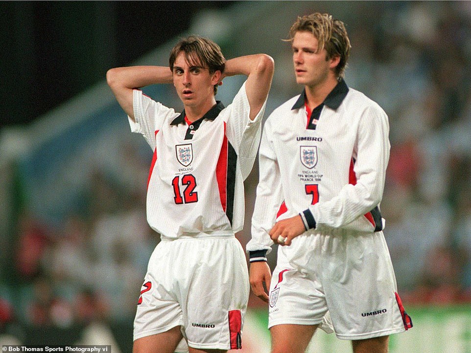 The former England player, pictured here with teammate Gary Neville, says he fell into depression after the sending off