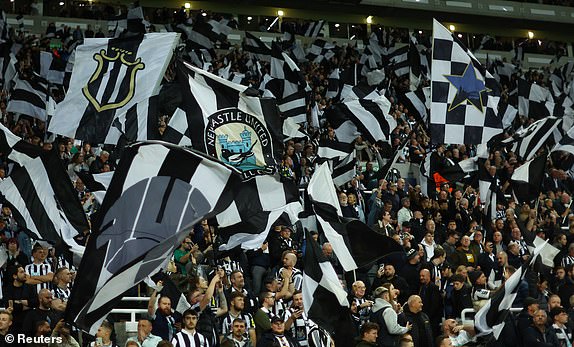 Soccer Football - Champions League - Group F - Newcastle United v Paris St Germain - St James' Park, Newcastle, Britain - October 4, 2023 Newcastle United fans with flags inside the stadium before the match REUTERS/Carl Recine