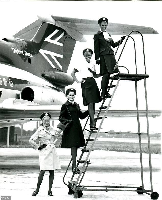 A wonderful selection of previously-unseen photographs showcasing the uniforms of air stewardesses who helped to ferry passengers around the world have been released by British Airways for its centenary this year. Above: Stewards from BEA, which merged with BOAC to create the British Airways name in 1972, pose in the 1967 uniform. It was made from terylene and worsted