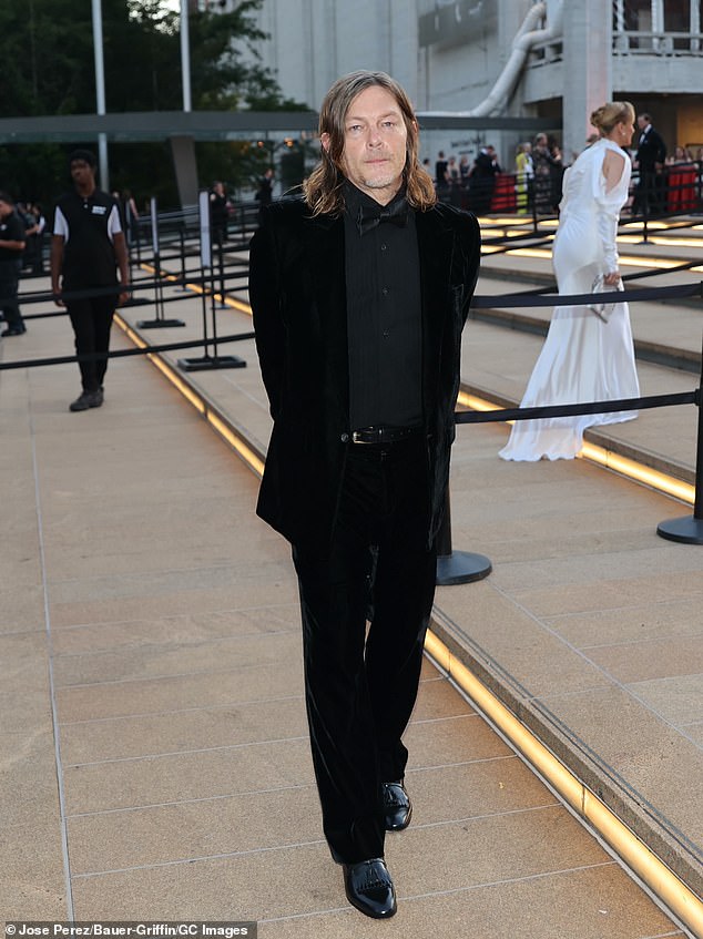 A far cry from his Walking Dead character! Norman cleaned up remarkably well in an all-black tuxedo and glossy patent-leather dress shoes