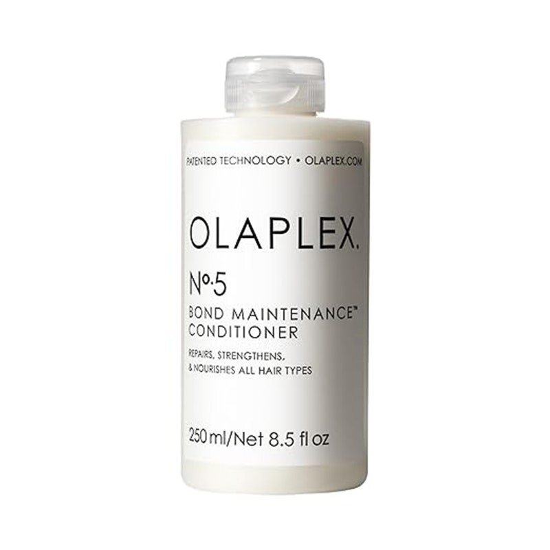 Olaplex Nr. 5 Bond Maintenance Conditioner: Eine durchsichtige Flasche mit weißem Etikett und schwarzem Text auf weißem Hintergrund