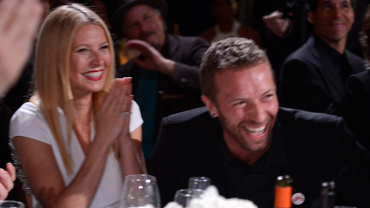 Gwyneth Paltrow und Chris Martin lachen