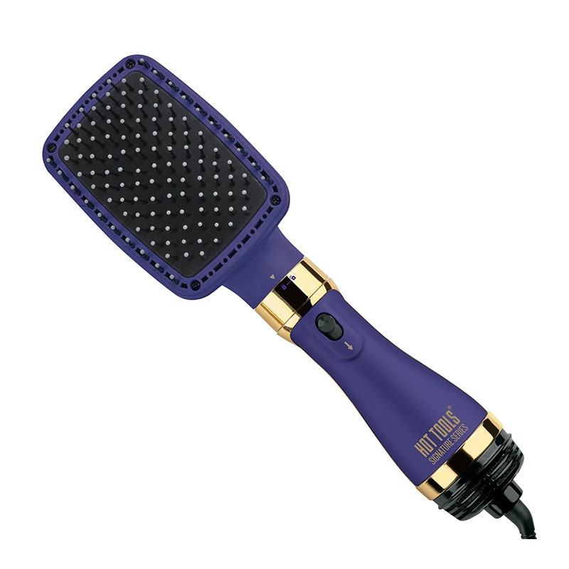 Hot Tools Pro One-Step Paddle-Haartrockner und Styler: Ein lilafarbener Paddelbürsten-Haartrockner auf weißem Hintergrund