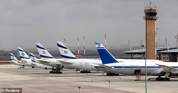 FILE PHOTO: El Al Israel Airlines planes are seen on the tarmac at Ben Gurion International airport in Lod, near Tel Aviv, Israel March 10, 2020. REUTERS/Ronen Zvulun/File Photo