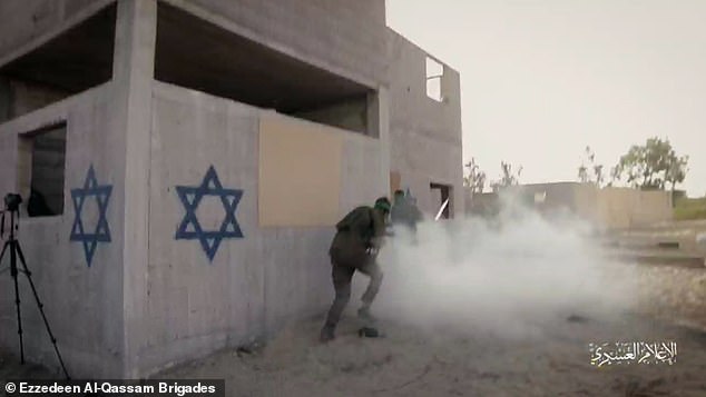Footage shows the fighter storming buildings marked with the Star of David and opening fire on targets