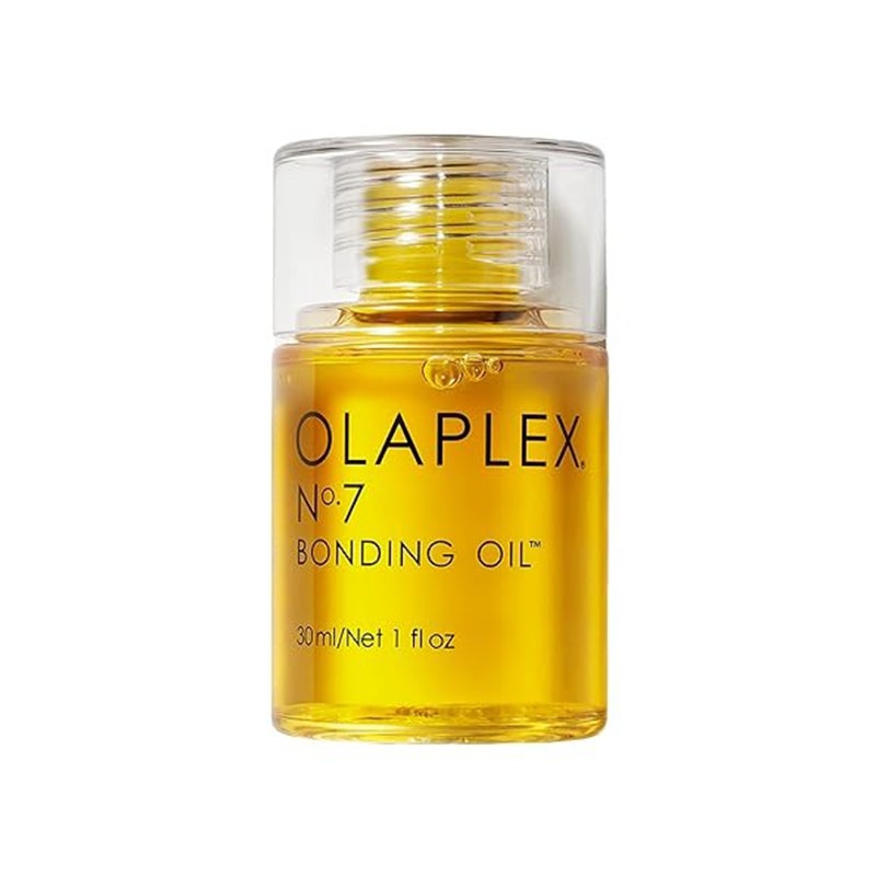 Olaplex Nr. 7 Bonding Oil: Eine kleine, klare Schraubflasche mit schwarzem Text, gefüllt mit goldfarbenem Haaröl auf weißem Hintergrund