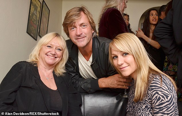 Close relationship: Chloe with her parents Judy Finnigan and Richard Madeley in London in 2011