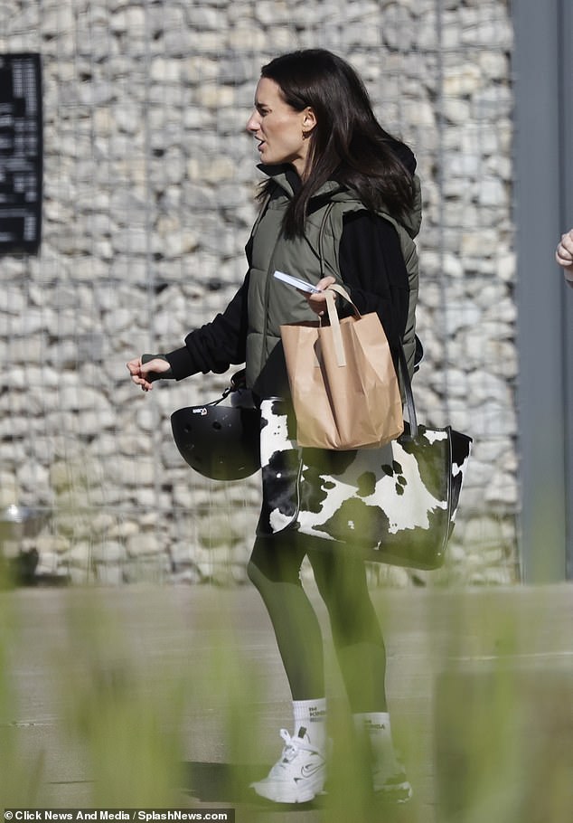 Fashion: The star, who rose to fame as the winner of Love Island back in 2017, carried her essentials in a large cow skin look handbag