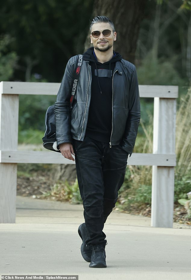 Smart: EastEnders star Rick Norwood also looked stylish as he donned a black leather jacket and black jeans