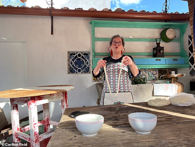 A 'pasta granny' shows Carlton's group how to make filendeu 'thread of God' pasta at Hotel su Gologone, one of the boutique hotels on Tourissimo's Chef¿s Bike Tour of Sardinia