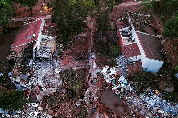 An aerial view shows damage caused following a mass infiltration by Hamas gunmen from the Gaza Strip, in Kibbutz Beeri in southern Israel, October 11, 2023. REUTERS/ Ilan Rosenberg