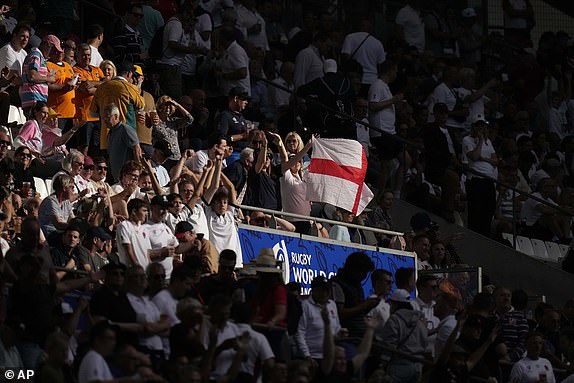England's fans cheer before the Rugby World Cup quarterfinal match between England and Fiji at the Stade de Marseille in Marseille, France, Sunday, Oct. 15, 2023. (AP Photo/Pavel Golovkin)
