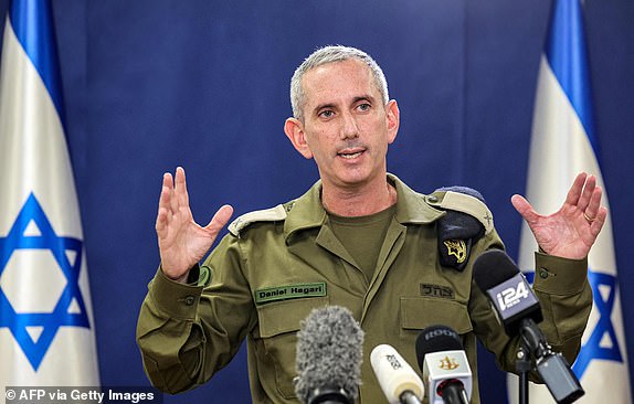 Israeli army spokesman Rear Admiral Daniel Hagari speaks to the press from The Kirya, which houses the Israeli Ministry of Defence, in Tel Aviv on October 18, 2023. At least 200 people were killed in an air strike on a hospital compound that sheltered the wounded and displaced from Israeli bombing, local health officials said on October 18, prompting global condemnation and fury. Spokesman Hagari told a press briefing that at the time of the strike, the Israeli army was not conducting air operations near the hospital and the rockets that hit the building did not match theirs. (Photo by GIL COHEN-MAGEN / AFP) (Photo by GIL COHEN-MAGEN/AFP via Getty Images)