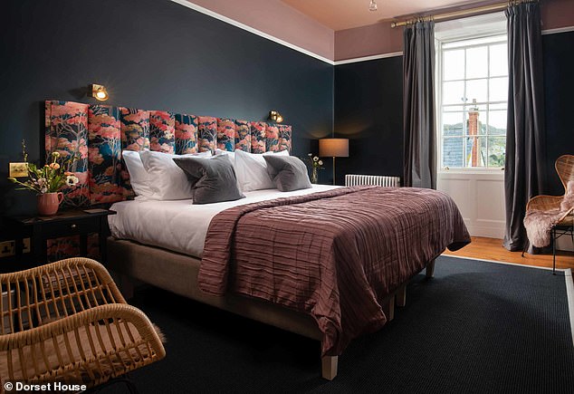 Dorset House in Lyme Regis, with its 'smart and uncluttered' rooms, has been named the best B&B in the UK. It's shown in the three images above