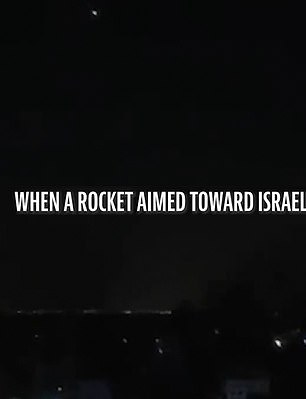 The rocket is seen streaking across the night sky