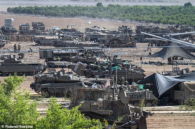 Tens of thousands of Israeli soldiers and scores of tanks and armoured vehicles are now positioned on the border