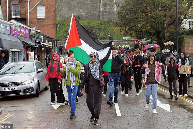 A free Palestine protest in Windsor town centre heads towards the castle