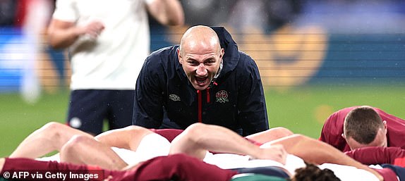 England's head coach Steve Borthwick speaks to his players during warm up ahead of the France 2023 Rugby World Cup semi-final match between England and South Africa at the Stade de France in Saint-Denis, on the outskirts of Paris, on October 21, 2023. (Photo by FRANCK FIFE / AFP) (Photo by FRANCK FIFE/AFP via Getty Images)