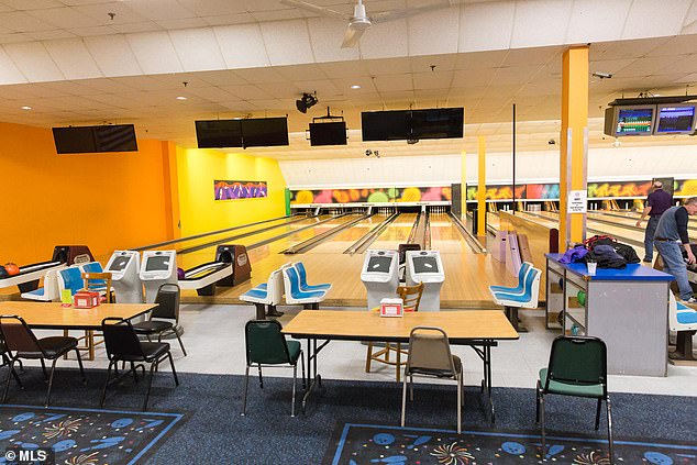 The shooter used an AR-15-style rifle to open fire inside the Just-In-Time Recreation bowling alley on Wednesday night. The venue is pictured above