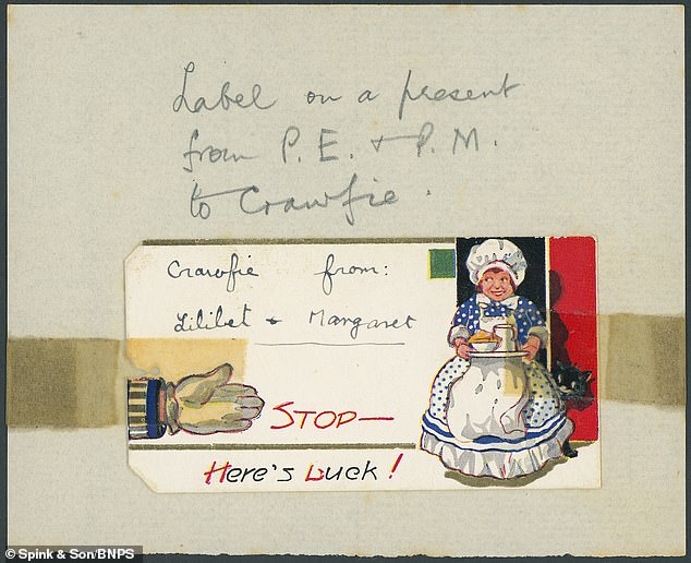 Eine weitere süße Karte zeigte eine Frau mit einem Kuchen, den Lilibet und Margaret Crawfie geschenkt hatten