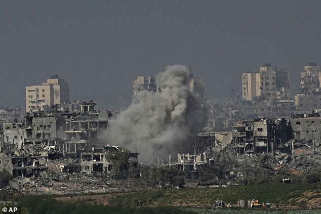 Smoke rises following an Israeli airstrike in the Gaza Strip, as seen from southern Israel, on Tuesday