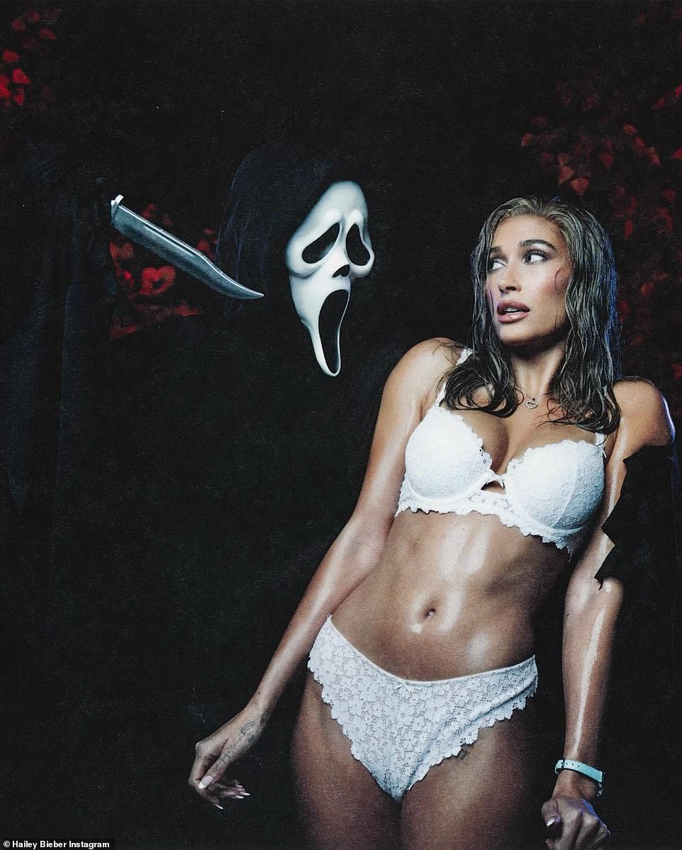 Hailey Bieber was Carmen Electra's character from Scary Movie. The model, 26, stripped down to just her white underwear to portray Carmen Electra in the iconic opening scene from the 2000 original horror comedy film. In the series of photos, she donned just a custom Victoria's Secret lace, push-up bra teamed with the matching cheeky bottoms and Converse sneakers while posing in the path of lawn sprinklers.