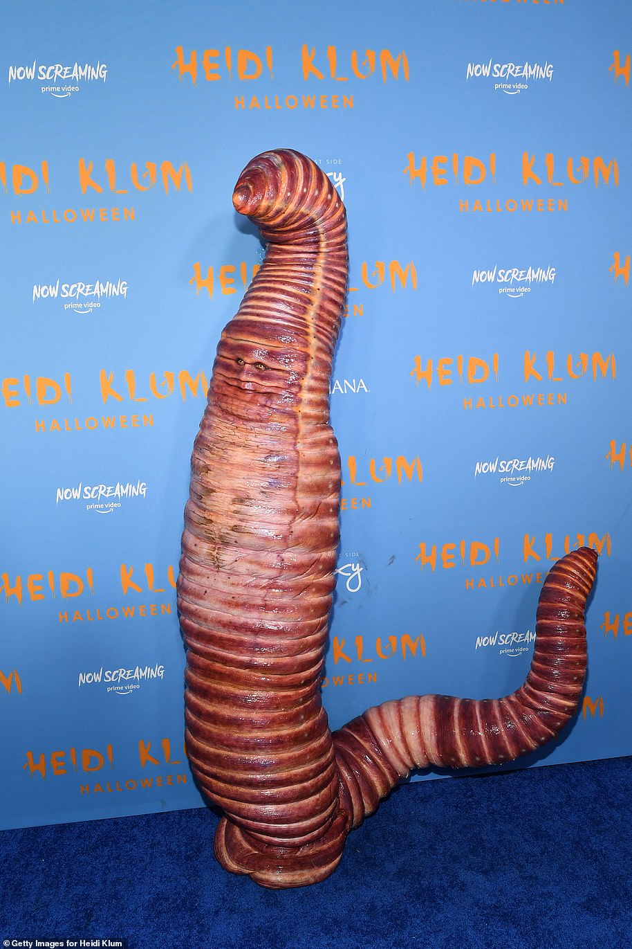 Wow: Klum slithered into a creepy ribbed red worm costume for her 21st annual Halloween party in 2022