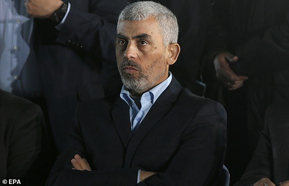 epa05874421 The new leader of Hamas movement in Gaza Strip Yahya Sinwar attends the memorial service for Mazen Faqhaa, senior leader of Ezz-Al Din Al Qassam Brigades, the armed wing of the Palestinian Hamas movement, in Gaza City, Gaza Strip, 27 March 2017. Mazen Faqhaa was killed on 24 March 2017 after gunmen shot dead him near his home in the Tal Al-Hawa neighborhood of Gaza City.  Faqhaa was freed by Israeli in 2011 prisoner swap with more than 1,000 other Palestinian prisoners in exchange for Gilad Shalit, an Israeli soldier Hamas had detained for five years. Hamas officials have said the killing bears the hallmarks of Israel's intelligence service Mossad, but Israel has not commented on the shooting.  EPA/MOHAMMED SABER