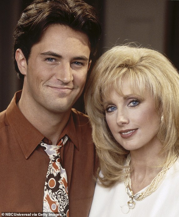FRIENDS -- "The One With Mrs. Bing" Episode 11 -- Pictured: (l-r) Matthew Perry as Chandler Bing, Morgan Fairchild as Nora Tyler Bing  (Photo by NBCU Photo Bank/NBCUniversal via Getty Images via Getty Images)