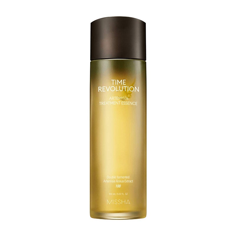Missha Time Revolution Artemisia Treatment Essence: An amber-tinted bottle on a white background