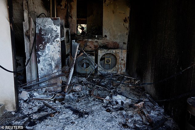 View of a burnt-out area at a destroyed home, following the deadly Oct. 7 attack by Hamas gunmen from the Gaza Strip, in Kibbutz Kissufim, southern Israel, on Wednesday