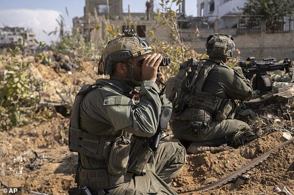 This photo released by the Israeli military on Thursday, Nov. 2, 2023, shows ground operations inside the Gaza Strip. (Israel Defense Forces via AP)