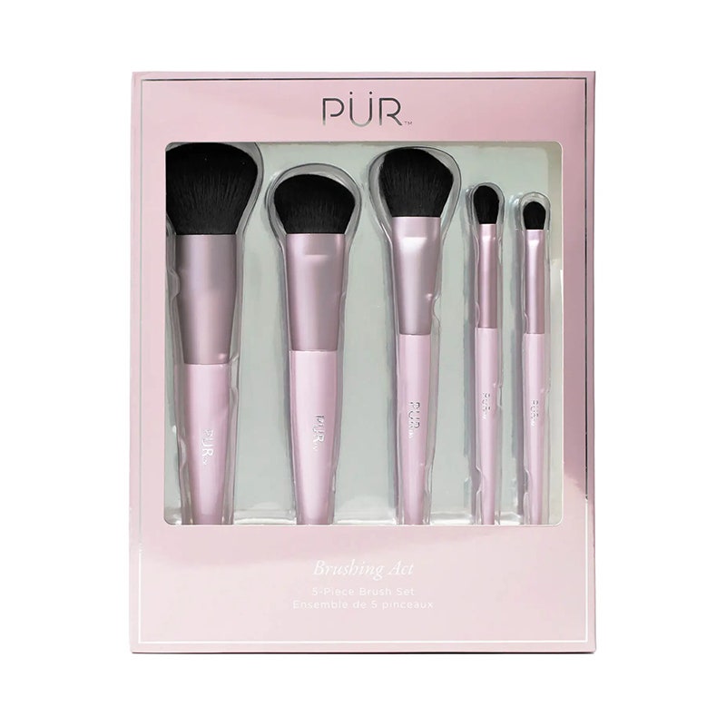 Pür Brushing Act Pinselset: Eine rosa Box gefüllt mit passenden Make-up-Pinseln auf weißem Hintergrund