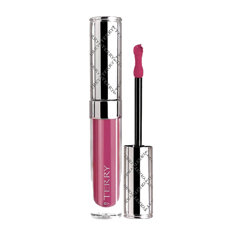 Von Terry Terrybly Velvet Rouge Lipstick: Eine lilafarbene flüssige Lippenstifttube mit silberner Kappe auf weißem Hintergrund