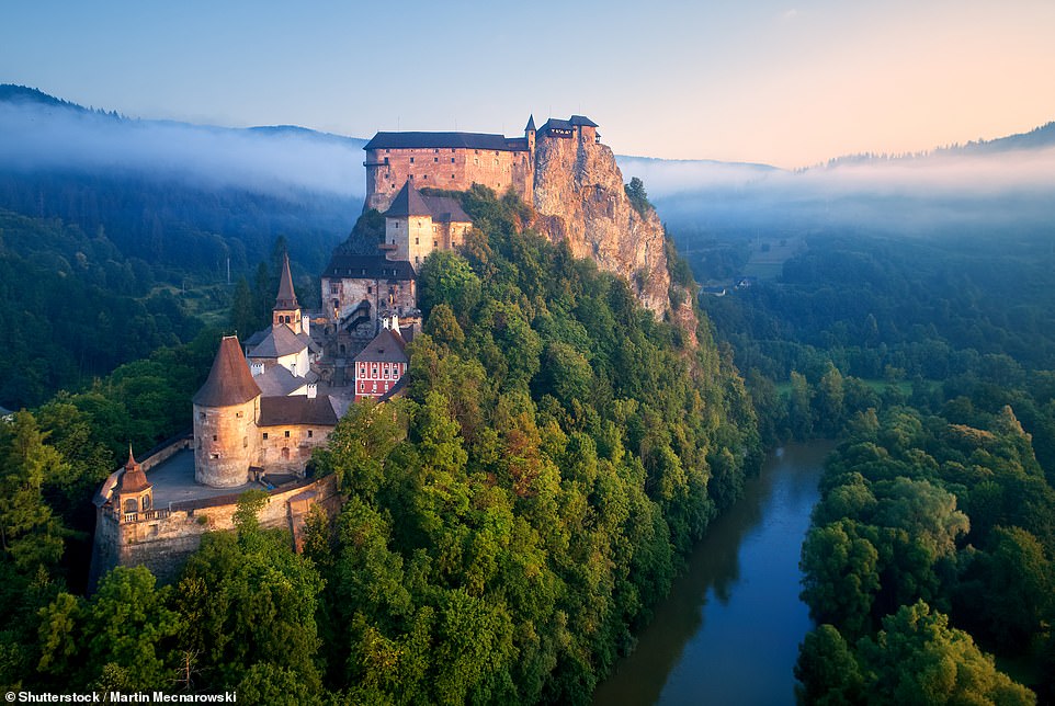Mist wraps around Slovenia's Orava Castle in this breathtaking picture. The 13th-century castle is situated on a high rock above the Orava River, near the village of Oravský Podzámok. It's now a museum where various tours, exhibitions and wedding ceremonies take place, its website notes