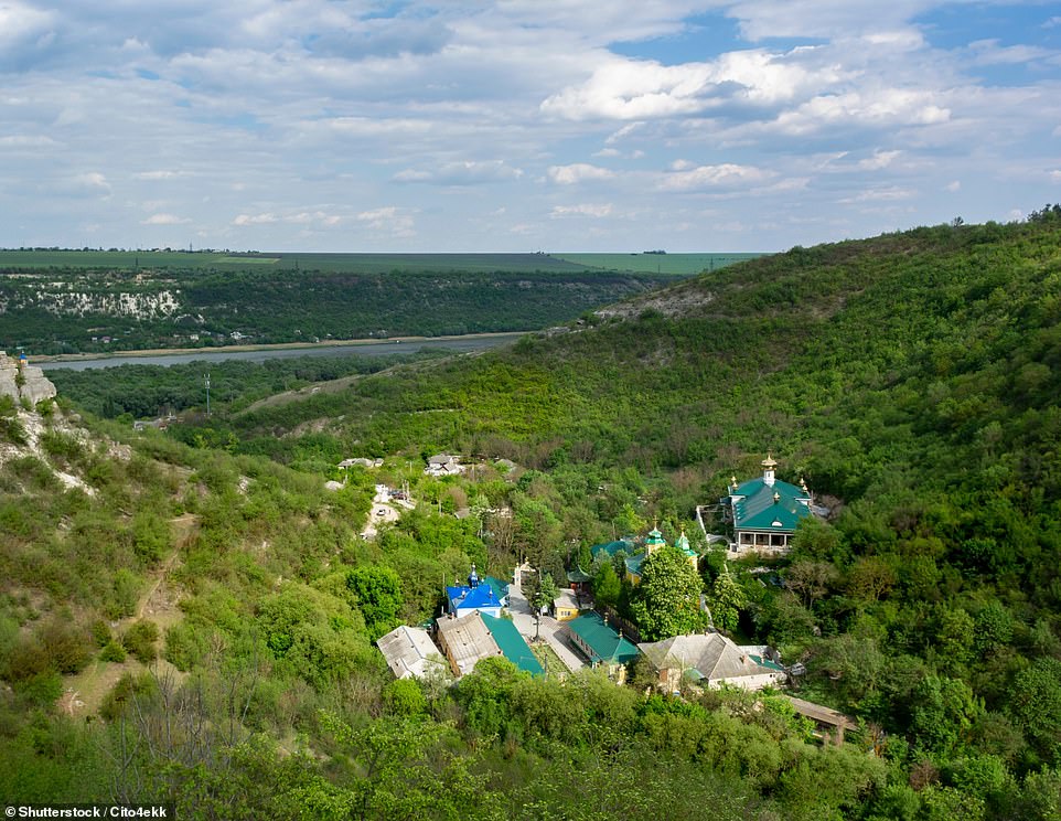 This picture shows the tiny village of Saharna in remote eastern Moldova. It's famously home to the 'Holy Trinity' Monastery, a popular site for religious pilgrimages, travel site Itanari reveals. Tripadvisor user Iudor described it as a 'very colourful and unusual place'. Many visitors also explore the 'spectacular' nearby Saharna Falls during their visit, travel blog Wonder Mondo notes