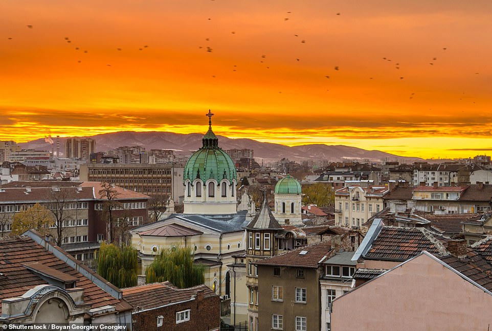 In this shot, a glowing sunset illuminates the skyline of Sofia, Bulgaria's capital. 'Sofia is no grand metropolis, but it's a modern, youthful city, with a scattering of onion-domed churches, Ottoman mosques and stubborn Red Army monuments that lend an eclectic, exotic feel,' Lonely Planet says of the city, noting that it's often overlooked by travellers that are heading to the country's ski slopes or beach resorts