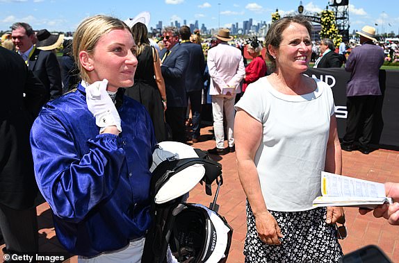MELBOURNE, AUSTRALIA - NOVEMBER 07: Jamie Kah and trainer Oopy MacGillivray after riding The Map to win Race 5, the The Macca's Run, during Melbourne Cup Day at Flemington Racecourse on November 07, 2023 in Melbourne, Australia. (Photo by Vince Caligiuri/Getty Images)
