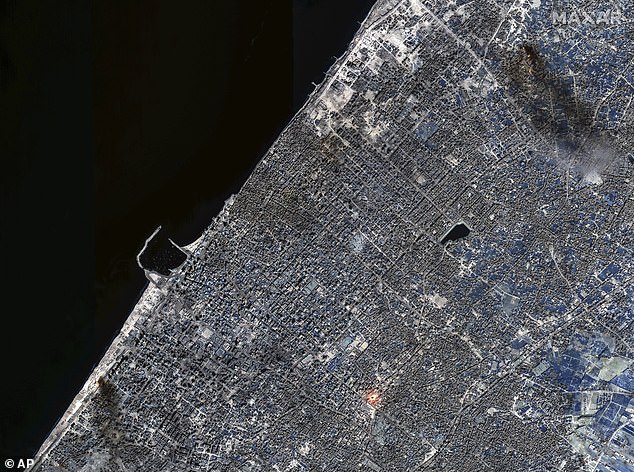 Smoke is seen rising over Gaza City in this satellite image released by Maxar Technologies