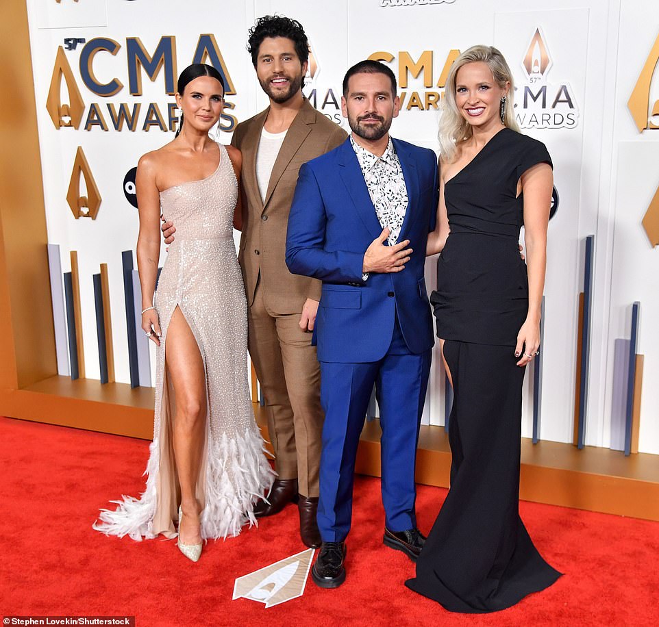 Dan + Shay seen above with their respective wives