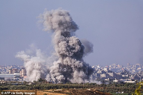 This picture taken from the Israeli side of the border with the Gaza Strip on November 10, 2023 shows billowing smoke during the Israeli bombardment of the Gaza Strip, amid ongoing battles between Israel and the Palestinian Hamas movement. (Photo by KENZO TRIBOUILLARD / AFP) (Photo by KENZO TRIBOUILLARD/AFP via Getty Images)