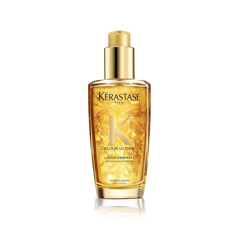 Kérastase Elixir Ultime L'Huile Original Haaröl: Eine klare Pumpflasche gefüllt mit goldfarbenem Haaröl auf weißem Hintergrund