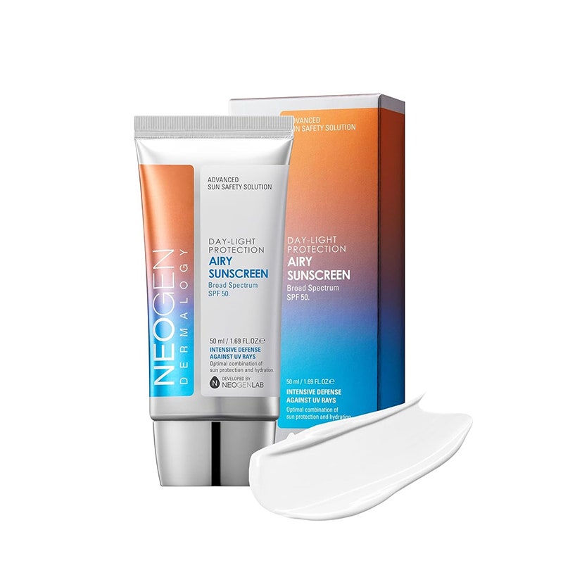 Neogen Day-Light Protection Airy Sunscreen: A white, orange, and blue tube with silver cap alongside a matching packaging box on a white background