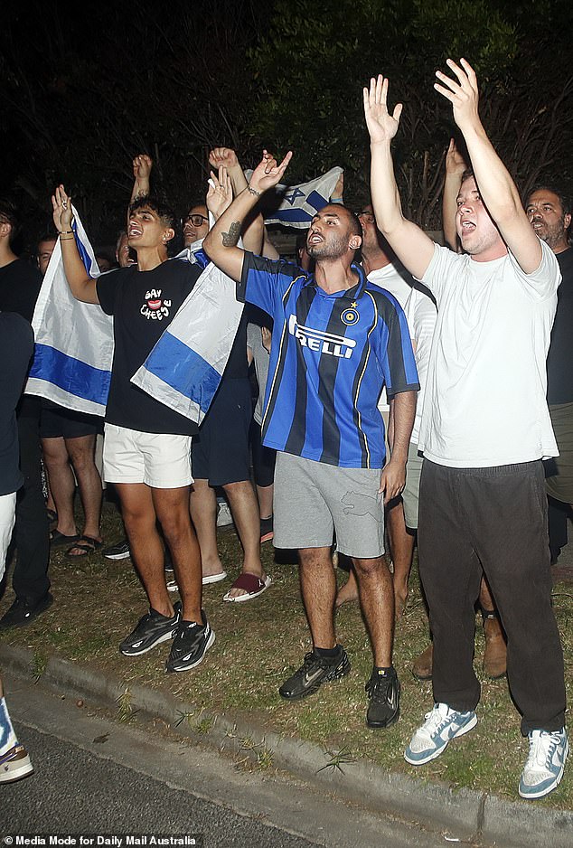 Israel supporters lined one side of the street as both groups hurled abuse at each other during a wild protest on Friday night