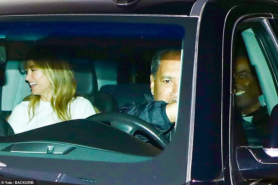 Catching a ride! Olivia Wilde was spotted departing the party with Chris Rock