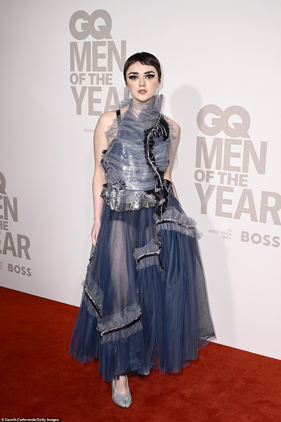 Style: Maisie Williams, 26, looked typically quirky in a bold blue ensemble