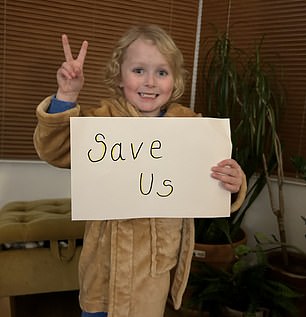 Willem, pictured holding a 'save us' sign, starts his day at 6am just so he can complete his medication before school