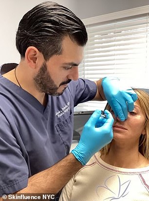 Dr Andrew Peredo, pictured above at his Skinfluence clinic in New York City, has revealed his view on the work the Kardashians and Jenners have done