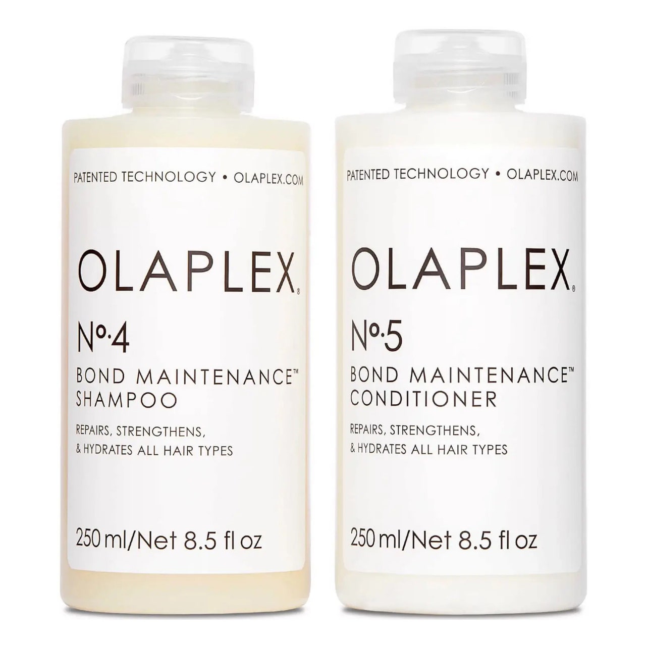 Olaplex Shampoo und Spülung Bündeln Sie zwei weiße Flaschen Shampoo und Spülung auf weißem Hintergrund