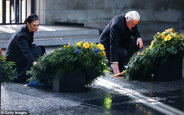 Crown Princess Victoria and German President Frank-Walter Steinmeier attend a wreath-laying ceremony at the Neue Wache memorial to the victims of war and tyranny
